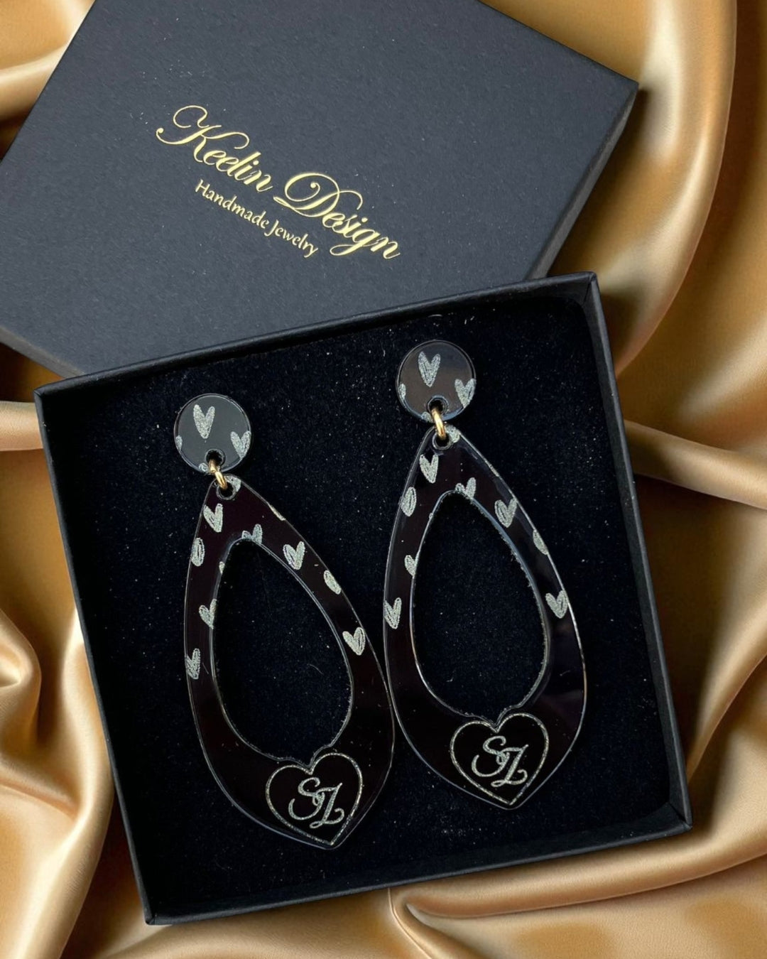 Keelin Design - Belgische Juwelen  Laser-cut en gegraveerde acryl oorbellen - Custom Design oorbellen